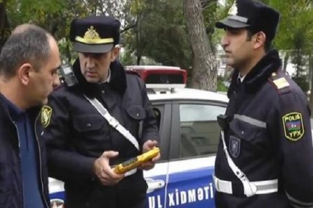 Yol polisi sürücünü təhdid etdi -
